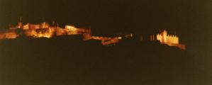 distant Edinburth Castle illuminated