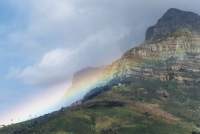 low rainbow in front of Devil's Peak