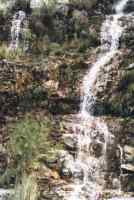 waterfalls on cliffs above Michell's Pass