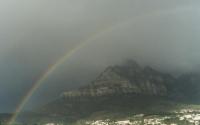 rainbow over Kloof Nek and Table Mountain from Camps Bay