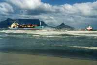 ship aground with Table Mountain from Sunset Beach