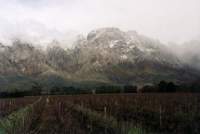snowy mountain range during storm at Franschoek