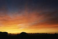 sunrise on cirrus over mountains
