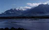 snowy peaks behind Berg river in flood
