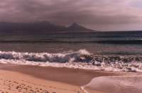 Table Mountain with heavy summer cloud from Milnerton Beach