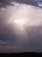 broken rainbow from summer shower