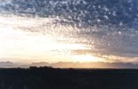 dawn behind alto cumulus