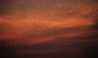 sunset chaos in cirrus clouds