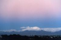 alpenglow at sunset over cloud on mountains