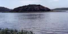 lake with island in the middle