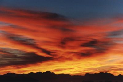 sunrise on cirrus over mountains 