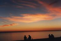 sundowners with cirrus over sea