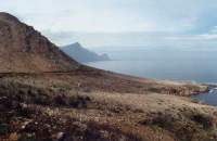 burned slopes of Kogelberg over sea towards Hangklip