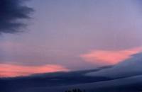 sunset on cirrus obscured by wall cloud