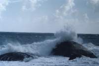 waves splashing on rock at Llandudno