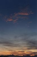 sunrise on two levels of clouds