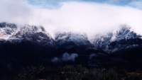 snow and cloud wreathed peaks in High Noon valley