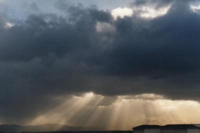 sunbeams through clouds