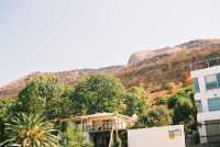 Paarl Rock burned slopes above houses