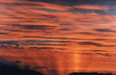 sunset on altocumulus with rays